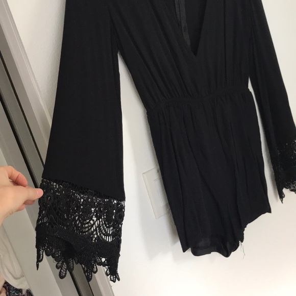 Black romper with lace bell sleeves. - Picture 2 of 2